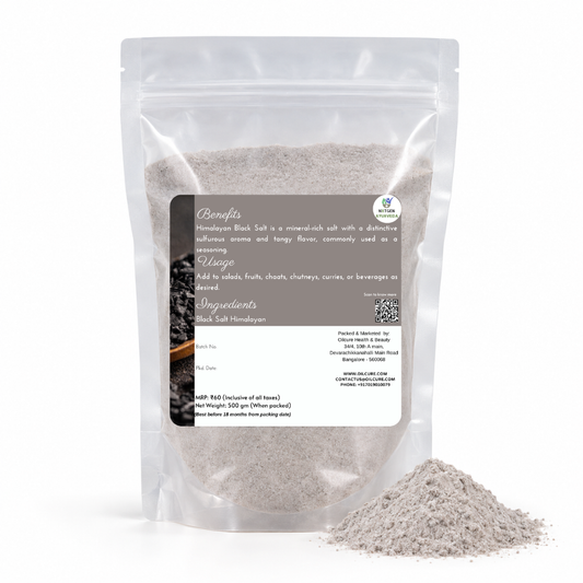Premium Himalayan Black Salt in a transparent stand-up pouch with fine black salt granules for seasoning, cooking, and traditional culinary use.